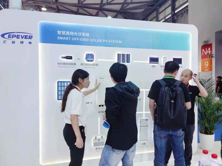 EPEVER sales representative introducing new solar product HP-AH65 to visitors